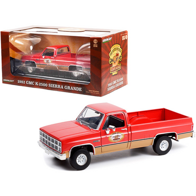 1982-gmc-k-2500-sierra-grande-wideside-pickup-truck-busted-knuckle-garage-1-18-diecast-model-car-by-greenlight