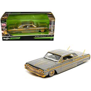 1964 Chevrolet Impala SS Lowrider Gray Metallic with Gold Graphics "Lowriders" "Maisto Design" Series 1/26 Diecast Model Car