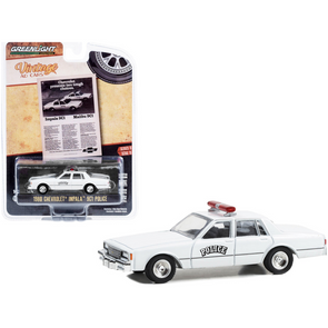 1980 Chevrolet Impala 9C1 Police White "Chevrolet Presents Two Tough Choices" "Vintage Ad Cars" Series 9 1/64 Diecast Model Car by Greenlight