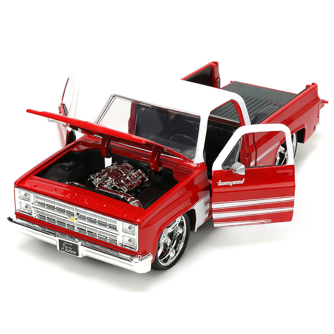 1985 Chevrolet C-10 Pickup Truck with Extra Wheels 1/24 Diecast Model Car by Jada