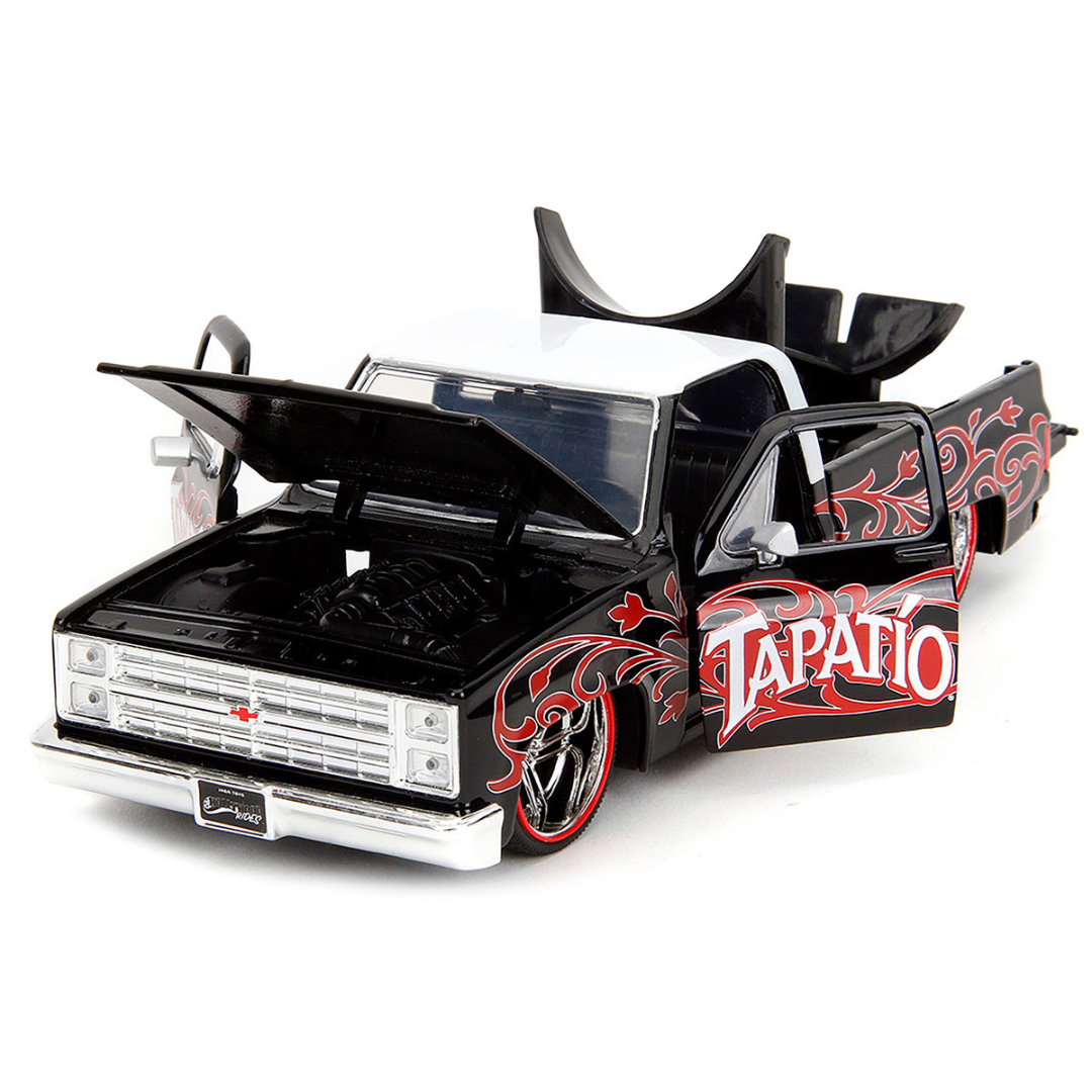 1985 Chevrolet C-10 Pickup Truck Black with White Top and Graphics with Charro Man Diecast Figure "Tapatio" 1/24 Diecast Model Car