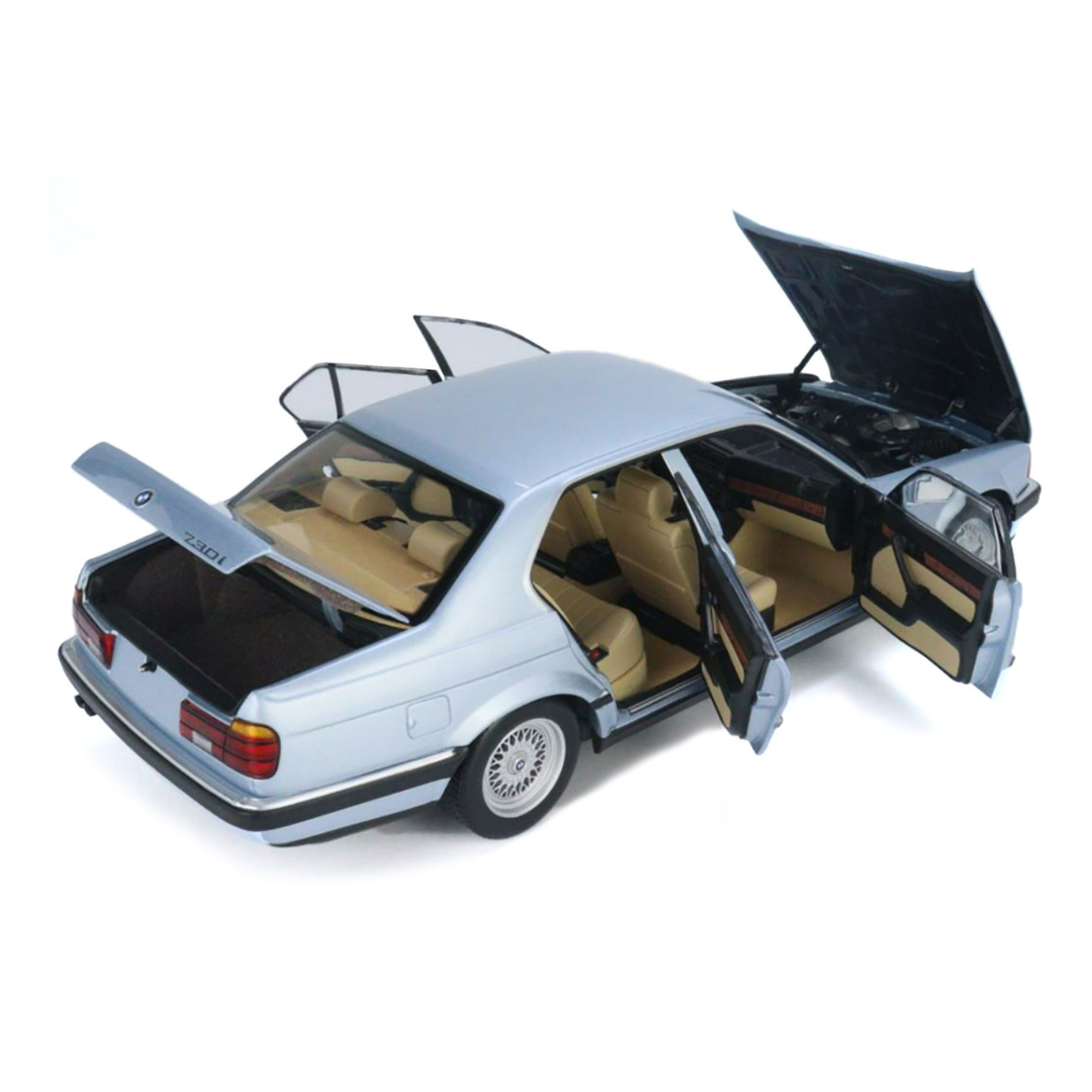 1986-bmw-730i-e32-light-blue-metallic-1-18-diecast-model-car-by-minichamps