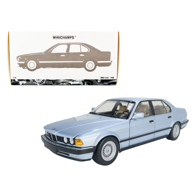1986-bmw-730i-e32-light-blue-metallic-1-18-diecast-model-car-by-minichamps